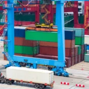 Commercial shipping containers used for secure storage and logistics at a European business site